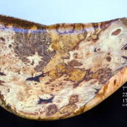 Item 215-A: 22.5” long x 17.25” wide x 7” tall. A highly figured and curvy burl and spalt maple bowl that is amazingly colorful and has been strengthened and sealed with clear epoxy.
