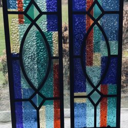 Fused glass with a stained glass look. Beautiful indoors or on the patio